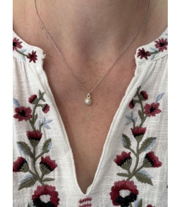 Pendentif en Perle d'eau douce sertie rond Argent rhodié